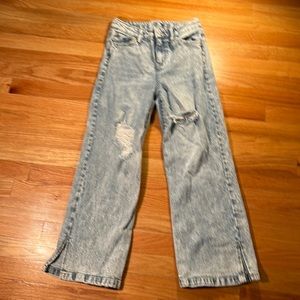 light blue ripped jeans